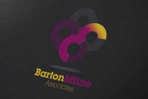 The Barton Milne Associates logo on dark paper background