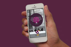 Man holding iPhone showing part of the Barton Milne Associates website