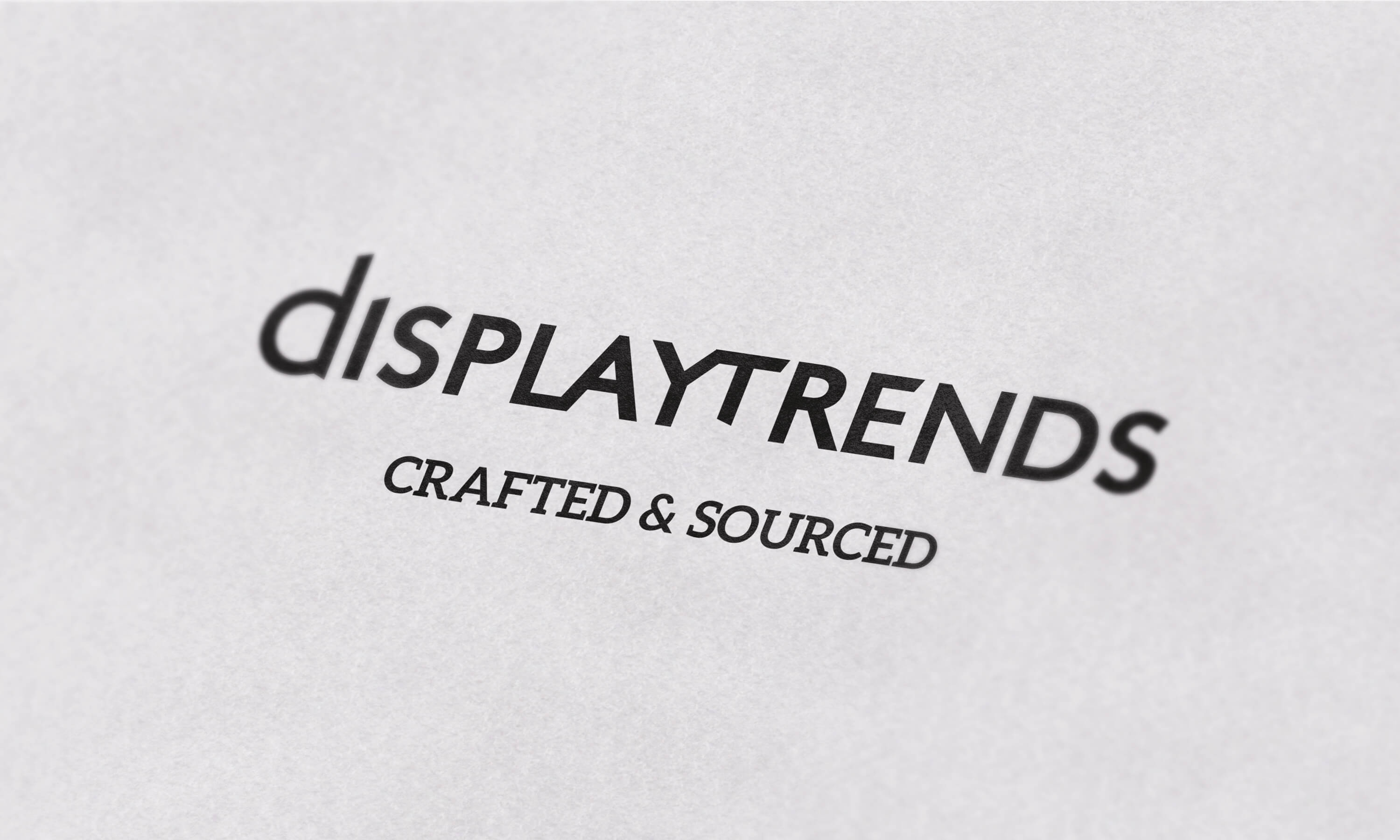 Close up of the Display Trends logo on white paper