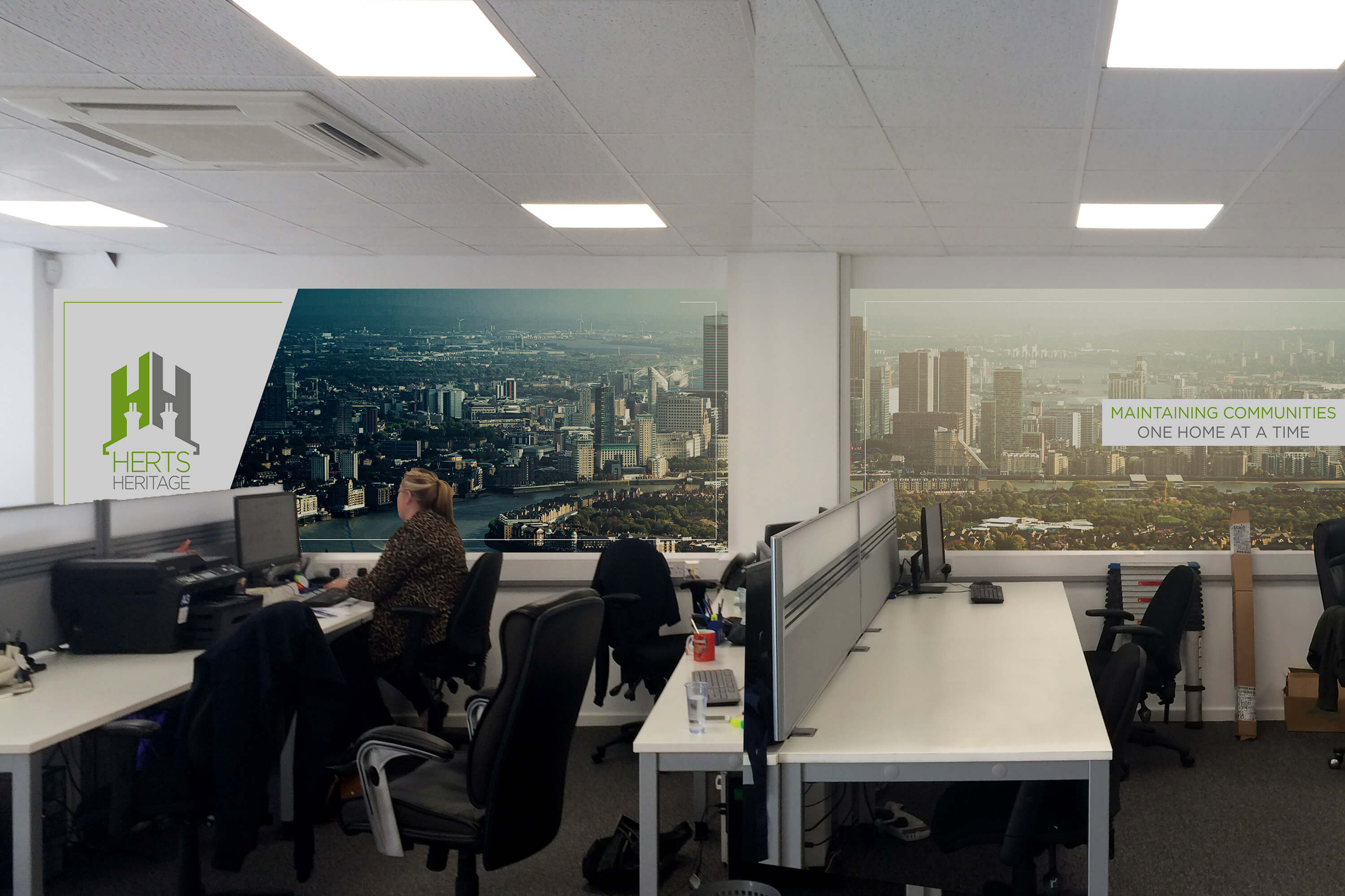 Internal office shot with design for Herts Heritage wall art in new rebrand style