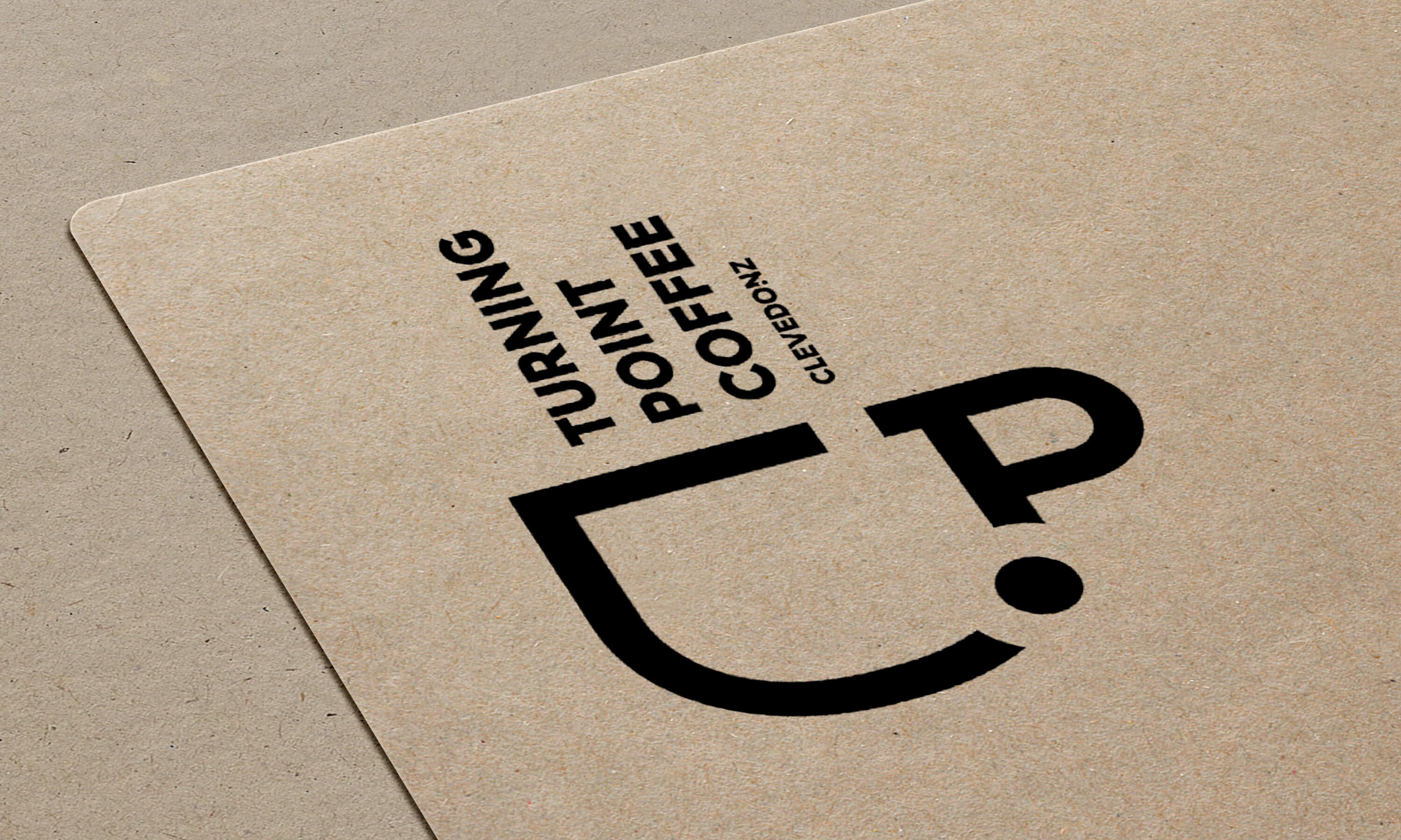 An close up of the Turning Point Coffee brand on card